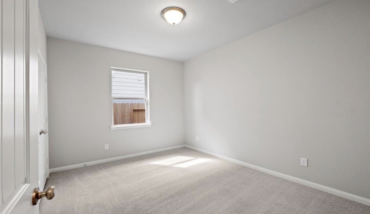 4327 Reese Ravine Lane Katy, TX 77493 - Photo 26 of 34 an empty room with a window