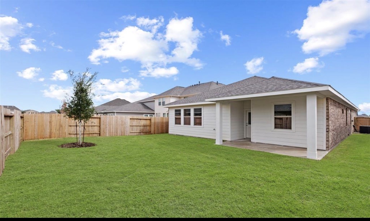 4327 Reese Ravine Lane Katy, TX 77493 - Photo 29 of 34 a view of a house with a yard