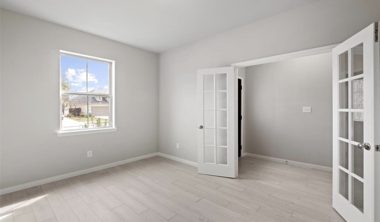 4327 Reese Ravine Lane Katy, TX 77493 - Photo 6 of 34 a view of an empty room with a window