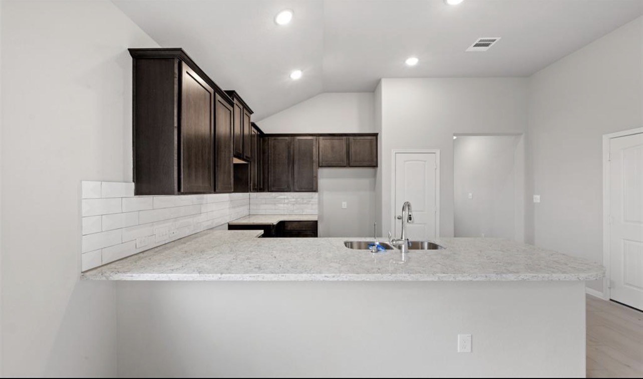 4327 Reese Ravine Lane Katy, TX 77493 - Photo 8 of 34 a bathroom with a sink and a mirror