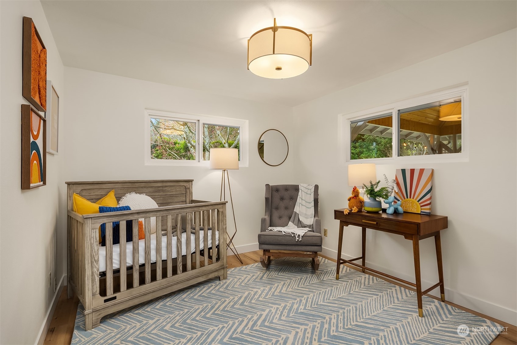 405 240th Street Southwest Bothell, WA 98021 - Photo 12 of 37 a bedroom with furniture and a window
