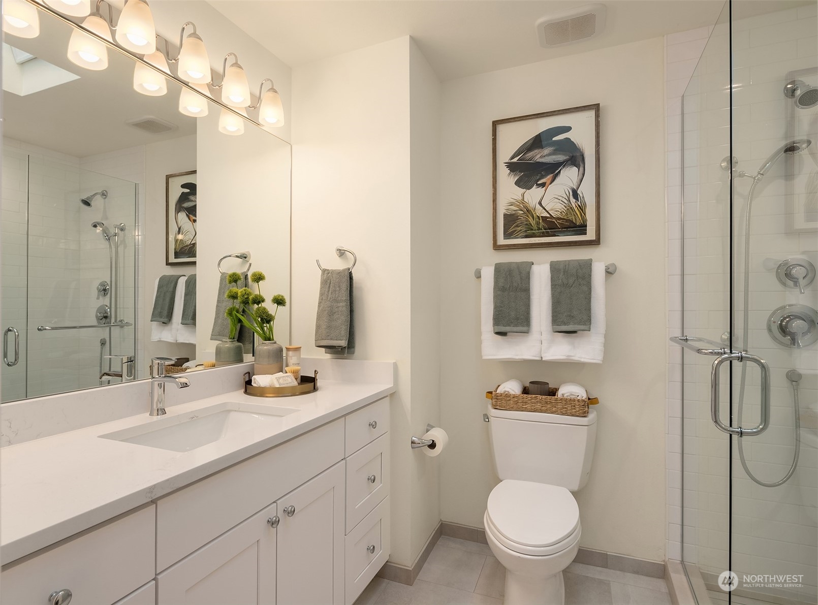 405 240th Street Southwest Bothell, WA 98021 - Photo 17 of 37 a bathroom with a toilet sink and mirror