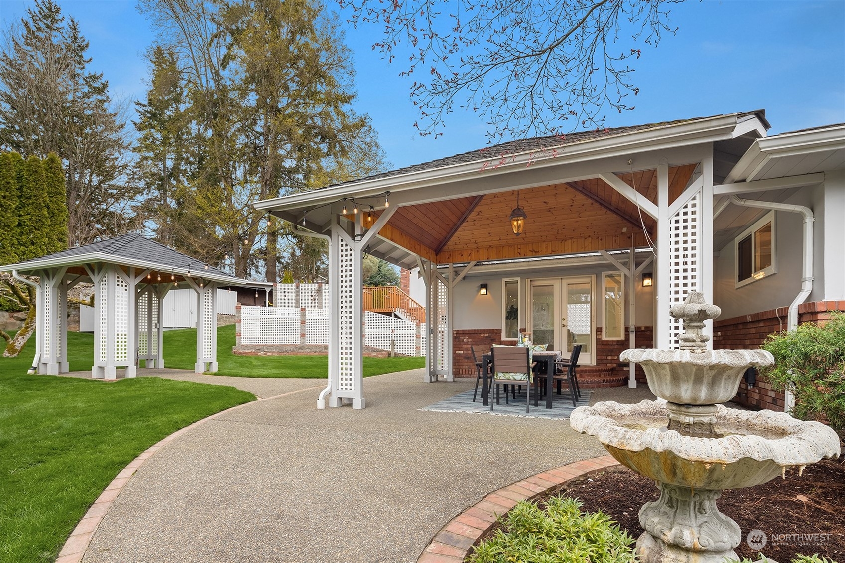 405 240th Street Southwest Bothell, WA 98021 - Photo 19 of 37 a view of house with yard outdoor seating and entertaining space
