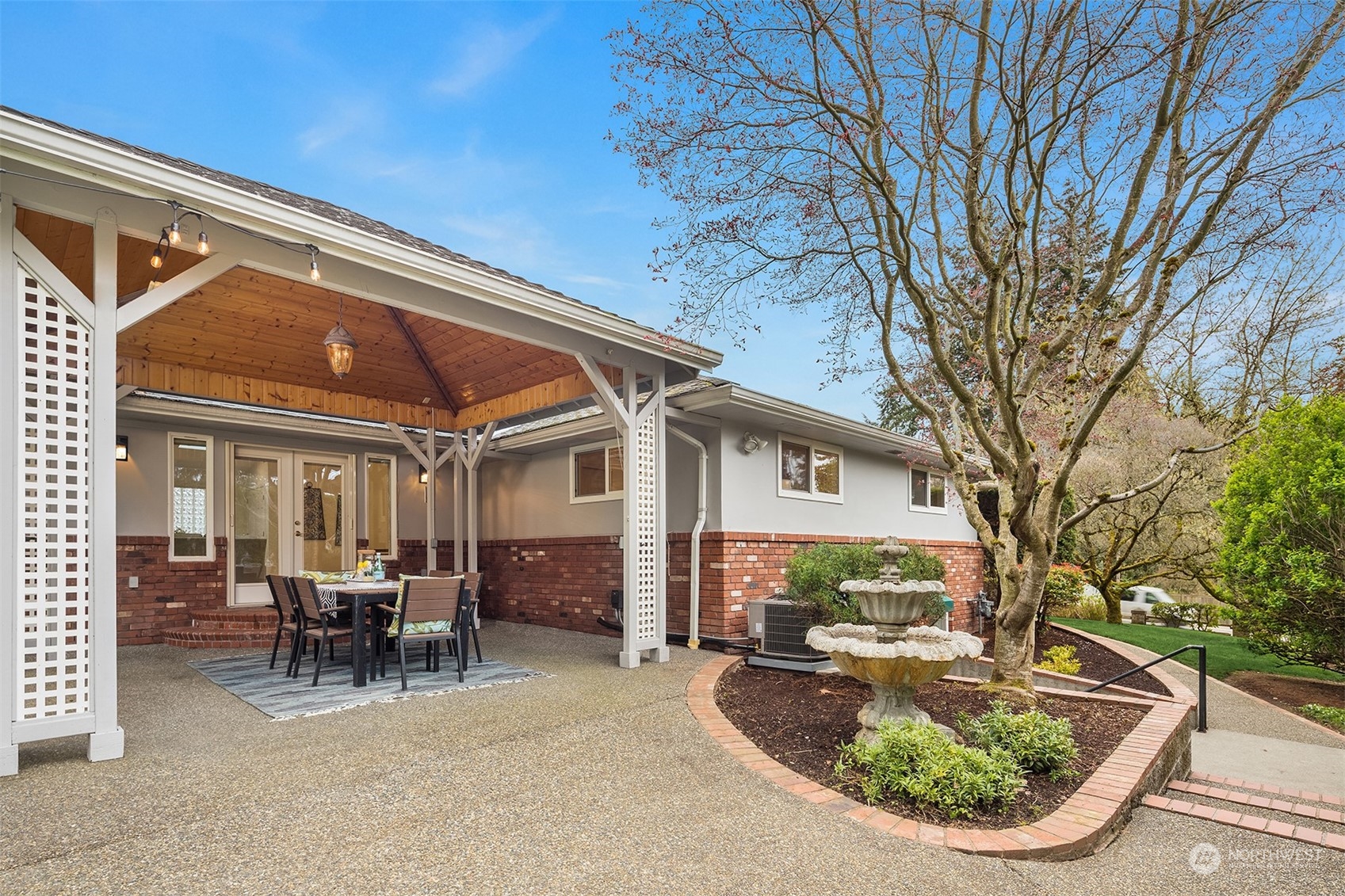405 240th Street Southwest Bothell, WA 98021 - Photo 20 of 37 a view of a house with backyard porch and sitting area