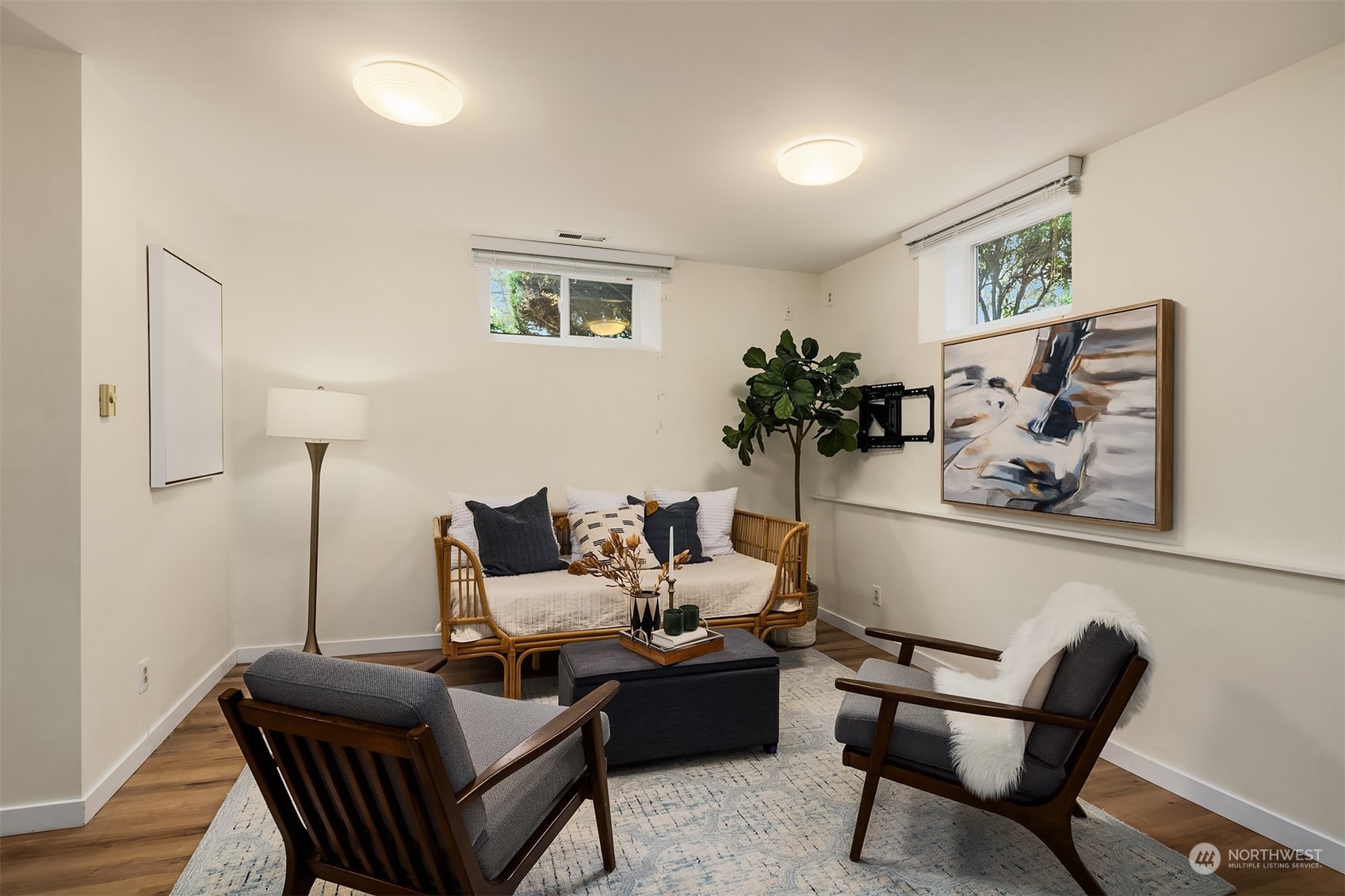 405 240th Street Southwest Bothell, WA 98021 - Photo 23 of 37 a living room with furniture and wooden floor