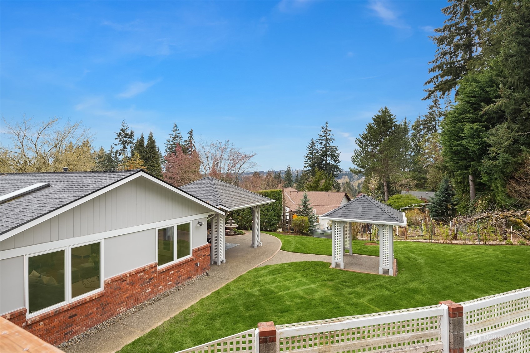 405 240th Street Southwest Bothell, WA 98021 - Photo 29 of 37 a front view of a house with a yard