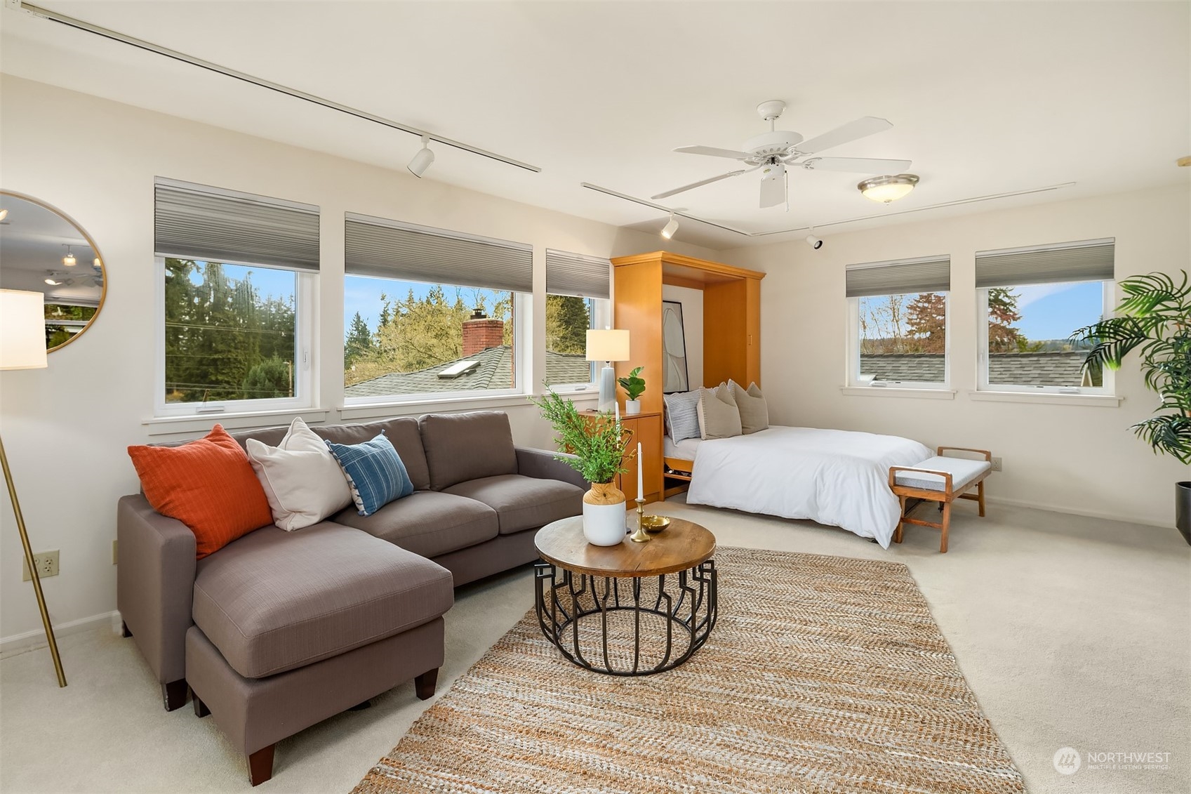 405 240th Street Southwest Bothell, WA 98021 - Photo 33 of 37 a living room with furniture and a large window