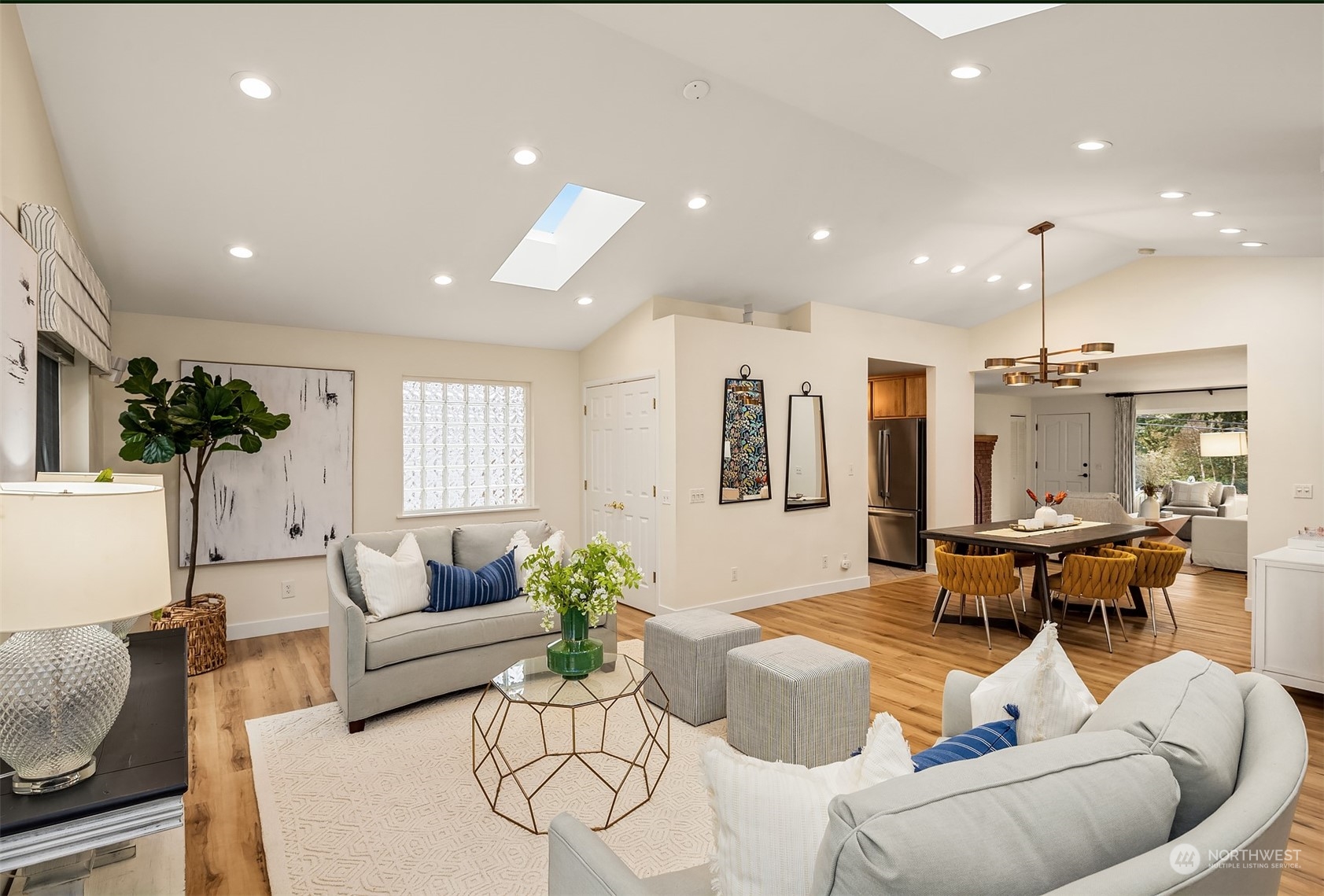 405 240th Street Southwest Bothell, WA 98021 - Photo 9 of 37 a living room with furniture and a large mirror