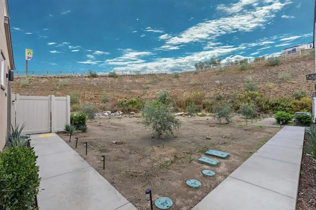 a view of a yard with an outdoor space