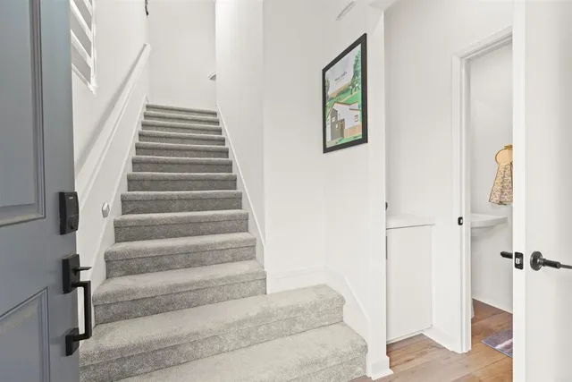 a view of staircase with white walls and white walls