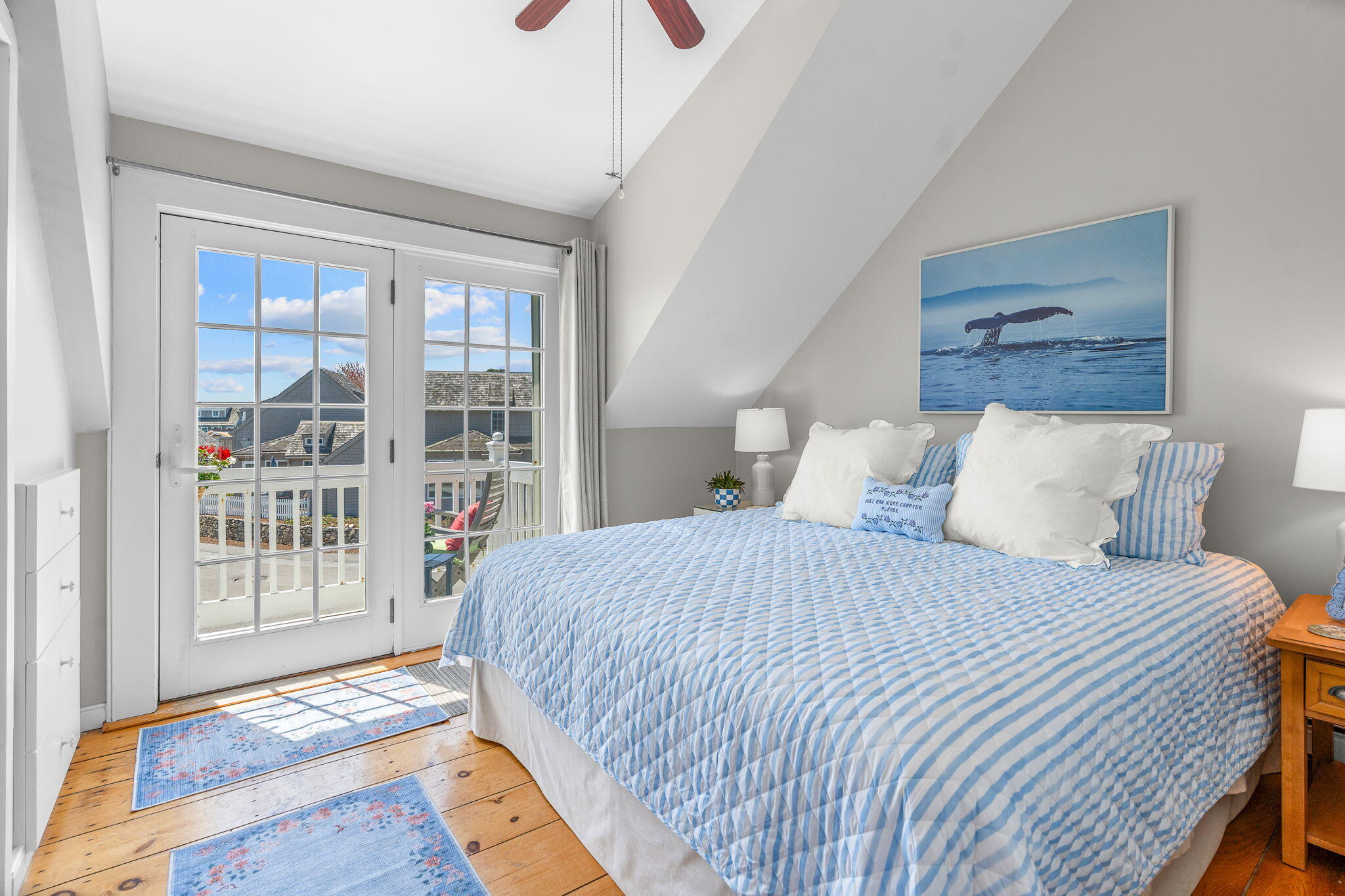 4 Race Point Road, Unit 4 Mashpee, MA 02649 - Photo 20 of 43 a bedroom with a bed and a large window