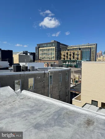 a kitchen with stainless steel appliances granite countertop a sink counter space and cabinets