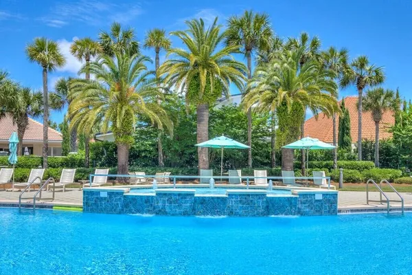 a view of a swimming pool with a patio