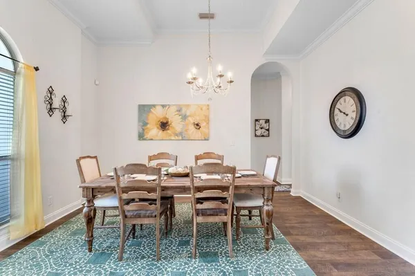 a table and chairs in a room