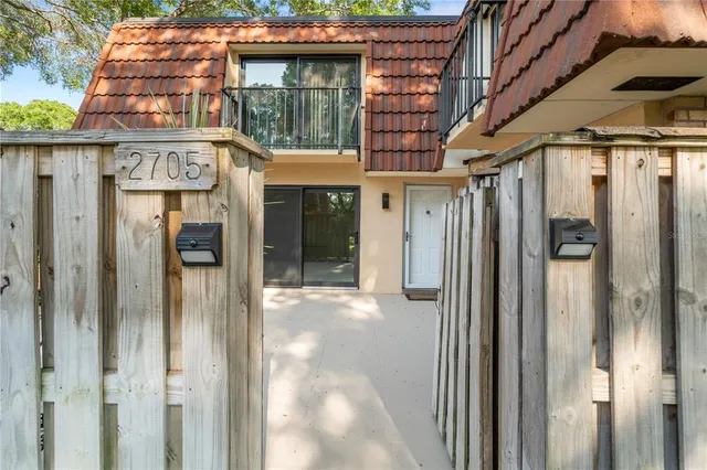 a view of a building with a glass door