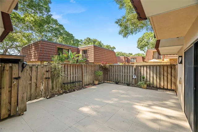 a view of a wrought iron fences in front of house