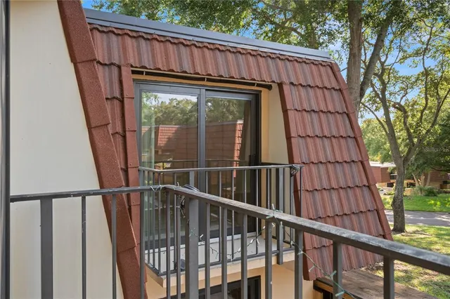 a view of a house with a large window