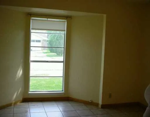 a kitchen with a sink stove and refrigerator