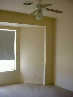 a view of house with backyard outdoor seating and entertaining space