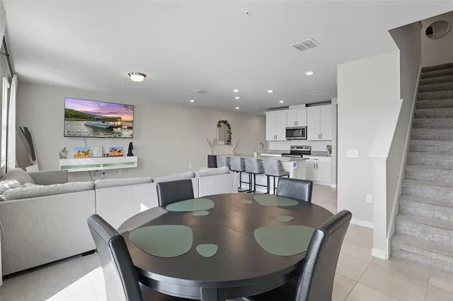 a view of a dining room with furniture
