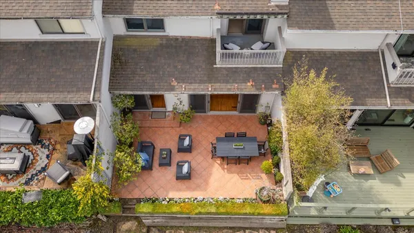 an aerial view of residential house with outdoor space