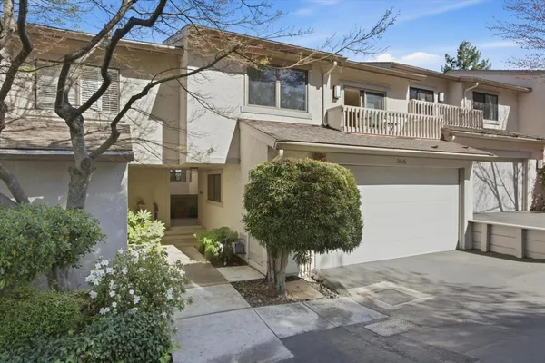 a house view with a outdoor space