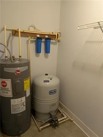 a view of backyard with large trees