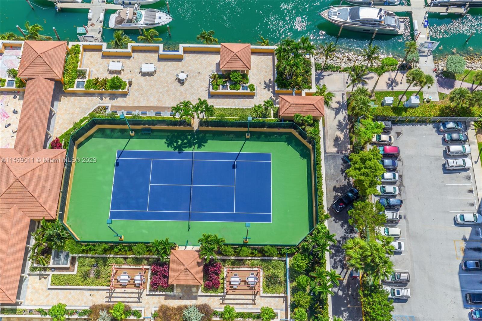 90 Alton Road, Unit 2807 Miami Beach, FL 33139 - Photo 24 of 30 an aerial view of a house with a garden and a car park