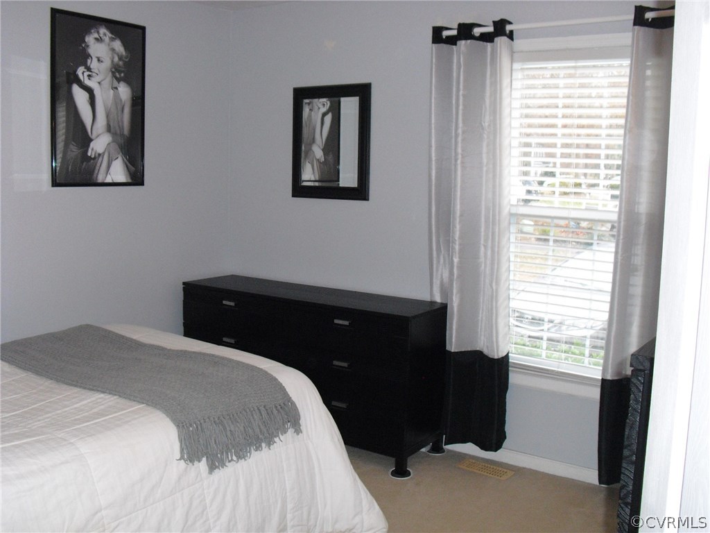5501 Chatmoss Road Midlothian, VA 23112 - Photo 12 of 29 a bedroom with a bed and a window