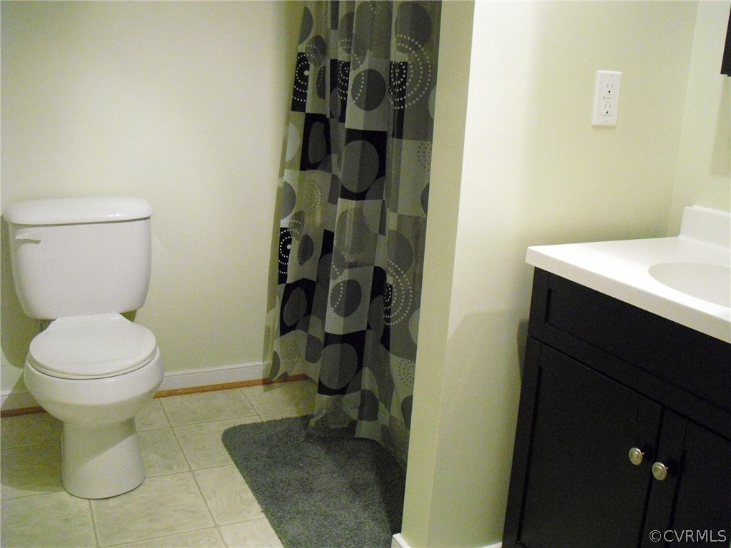 5501 Chatmoss Road Midlothian, VA 23112 - Photo 20 of 29 a bathroom with a toilet and a sink