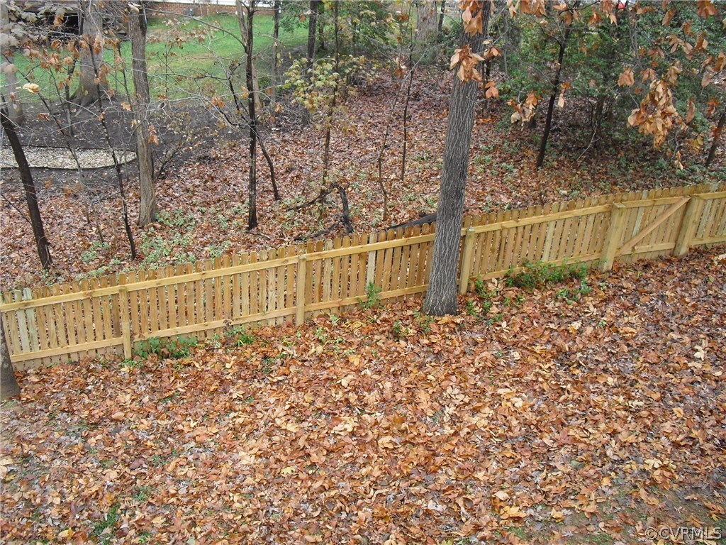 5501 Chatmoss Road Midlothian, VA 23112 - Photo 26 of 29 a view of a pathway of a house with large trees