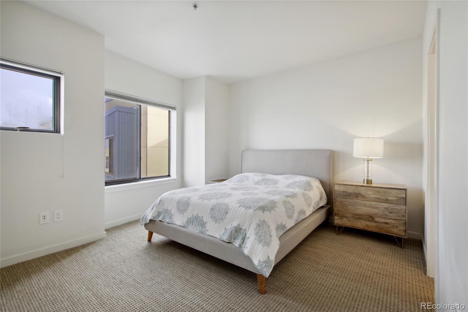 4520 Broadway, Unit 208 Boulder, CO 80304 - Photo 13 of 39 a bedroom with a bed and window
