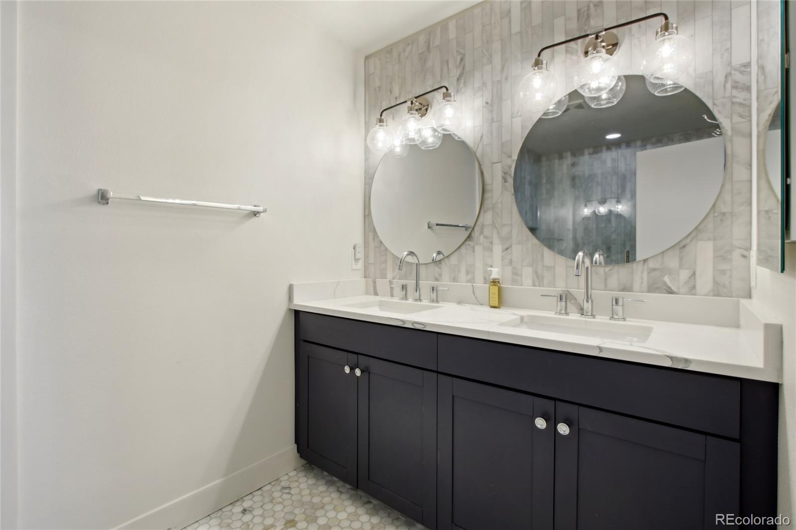 4520 Broadway, Unit 208 Boulder, CO 80304 - Photo 14 of 39 a bathroom with a sink and a mirror