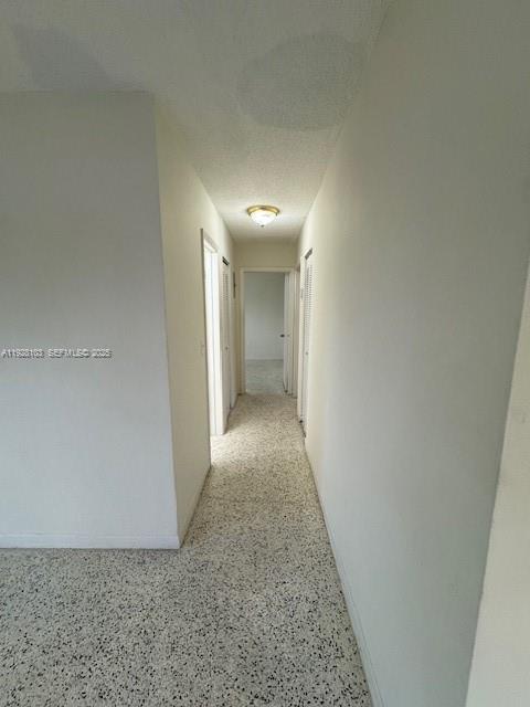 West Flagler Miami, FL 33126 - Photo 6 of 11 a view of a hallway with closet