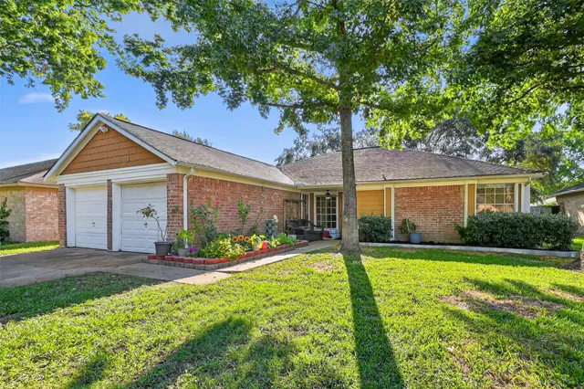 a view of a yard with green space
