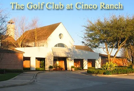 a sign on a wall next to a road