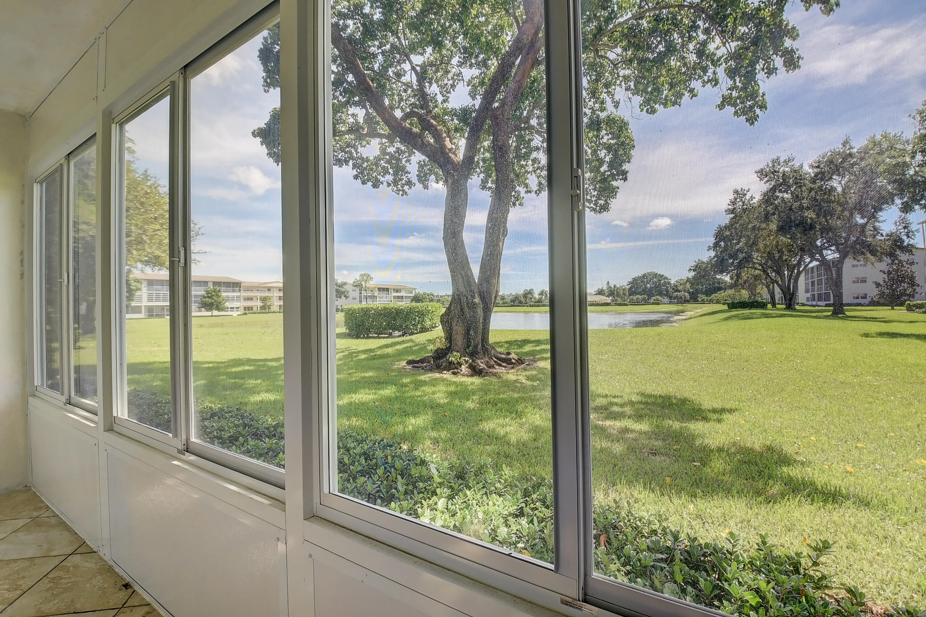261 Preston Way, Unit G Boca Raton, FL 33434 - Photo 17 of 46 Newly screened patio w/view of water