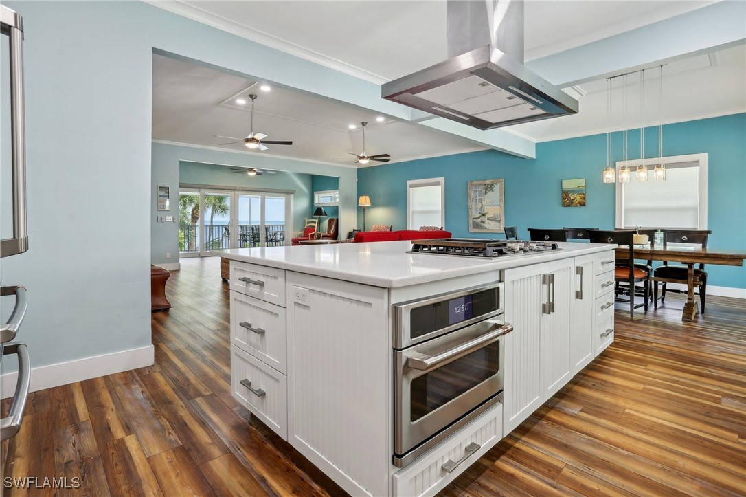 8335 Main Street Bokeelia, FL 33922 - Photo 26 of 47 a kitchen with a stove and a sink
