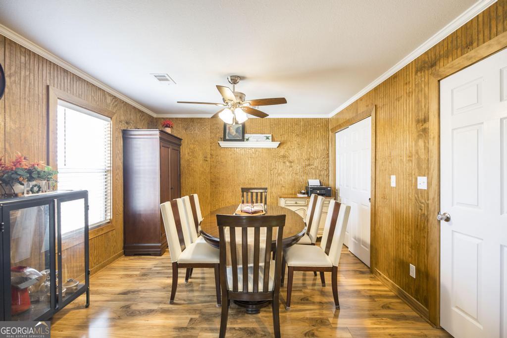 177 Lovett Scott Road Adrian, GA 31002 - Photo 14 of 37 a view of a dining room with furniture and a window