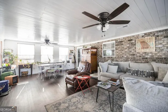 a roof deck with outdoor seating