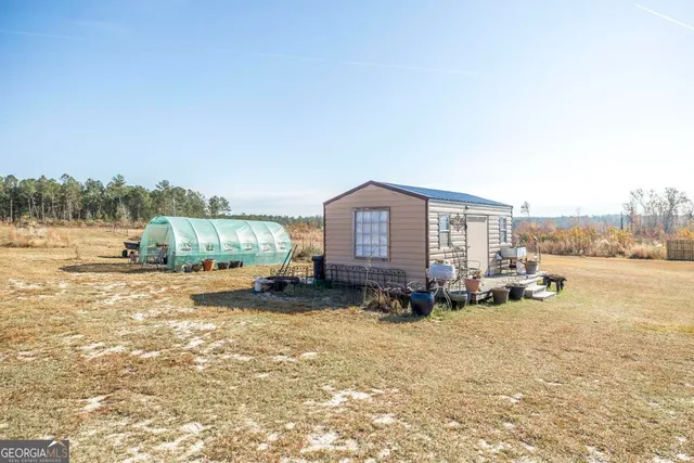 a view of a house with a park