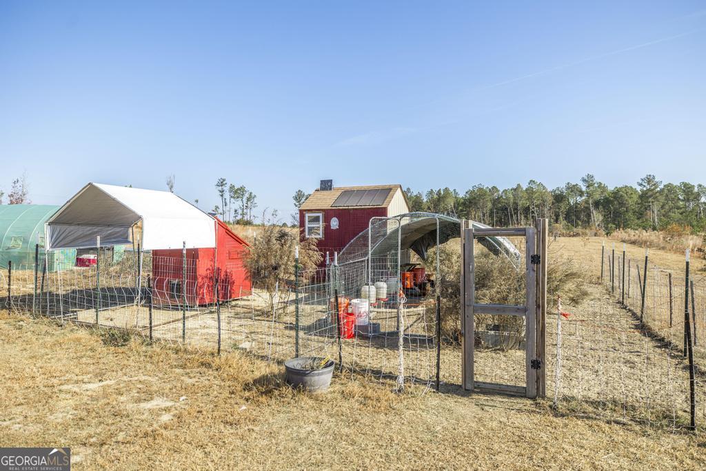 177 Lovett Scott Road Adrian, GA 31002 - Photo 30 of 37 a view of a house with a park