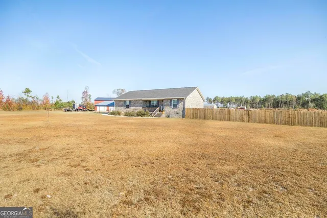 a view of a house with swimming pool