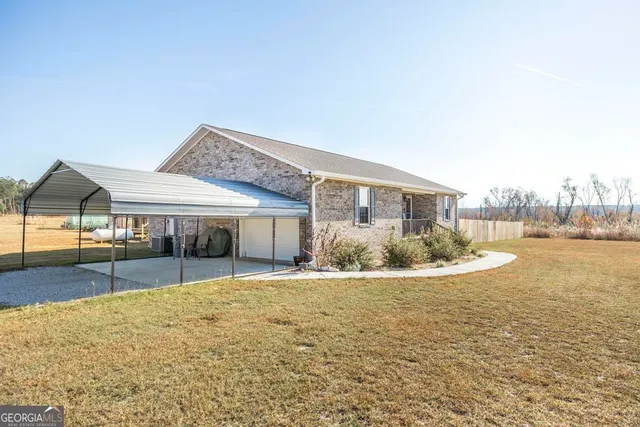 a outdoor living space with patio furniture and potted plants