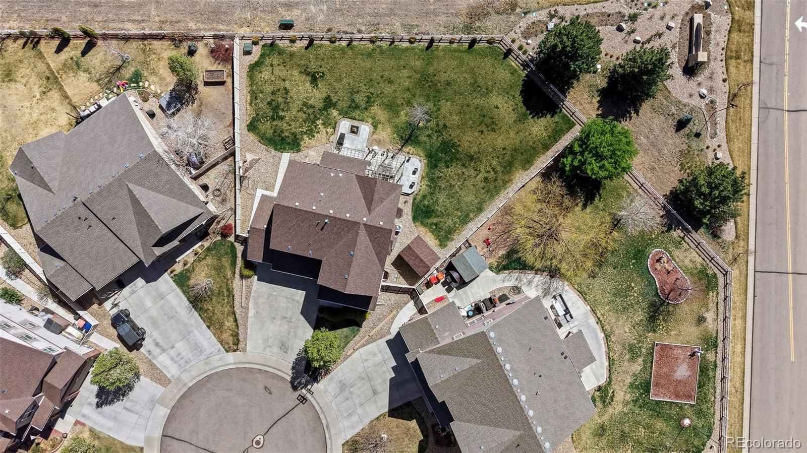 10039 Buttesfield Street Firestone, CO 80504 - Photo 34 of 35 an aerial view of a house with outdoor space