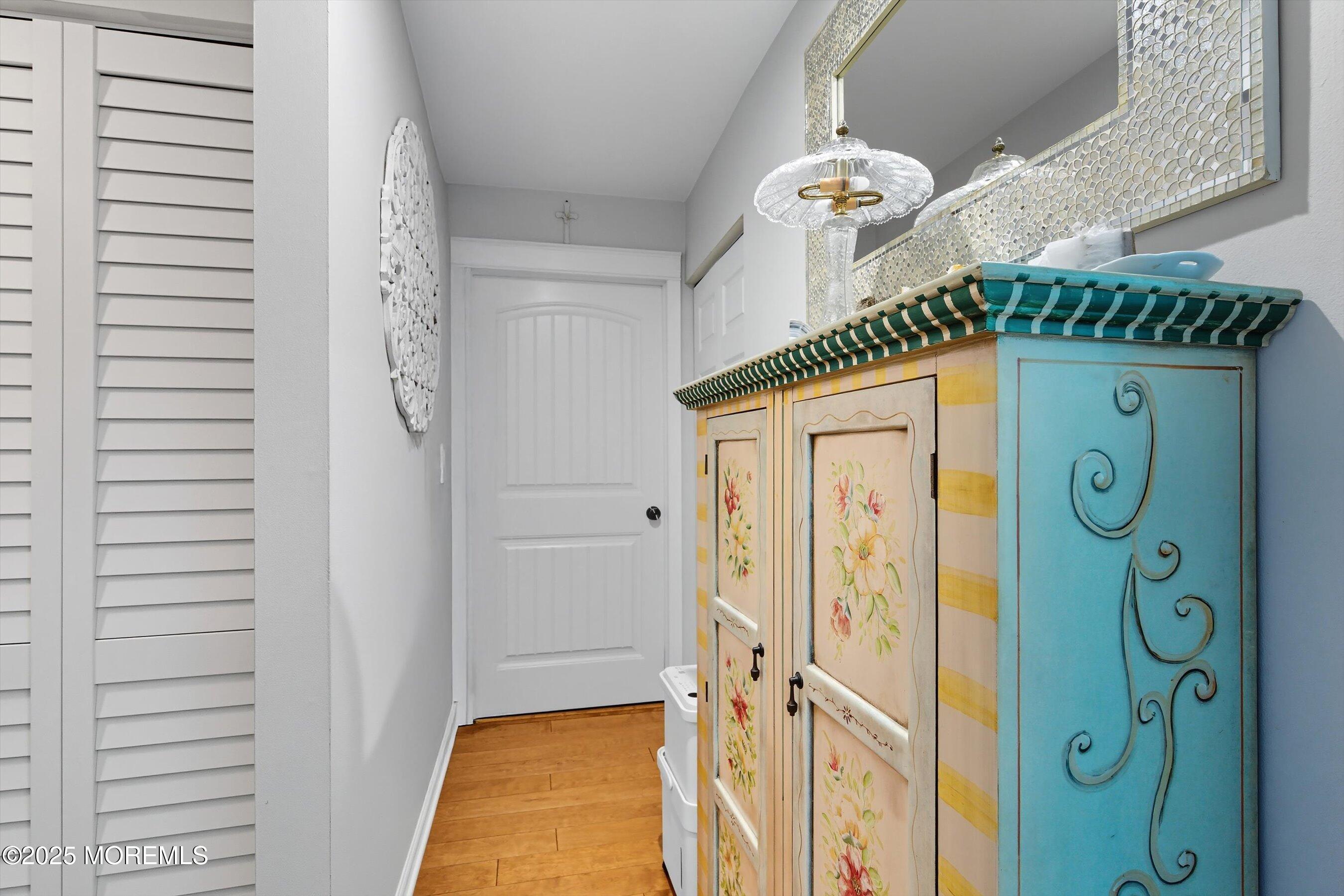 219 Lexington Drive Little Egg Harbor, NJ 08087 - Photo 14 of 30 a bathroom with a granite countertop sink and a mirror