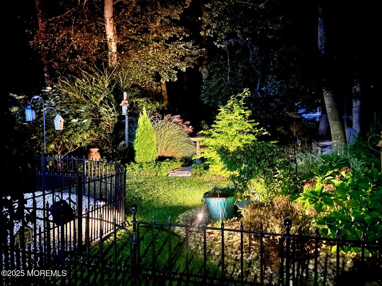 219 Lexington Drive Little Egg Harbor, NJ 08087 - Photo 18 of 30 a backyard of a house with lots of green space