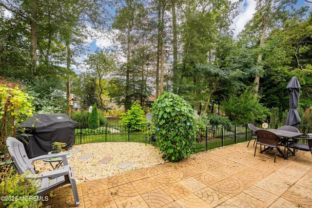 a view of backyard with seating space