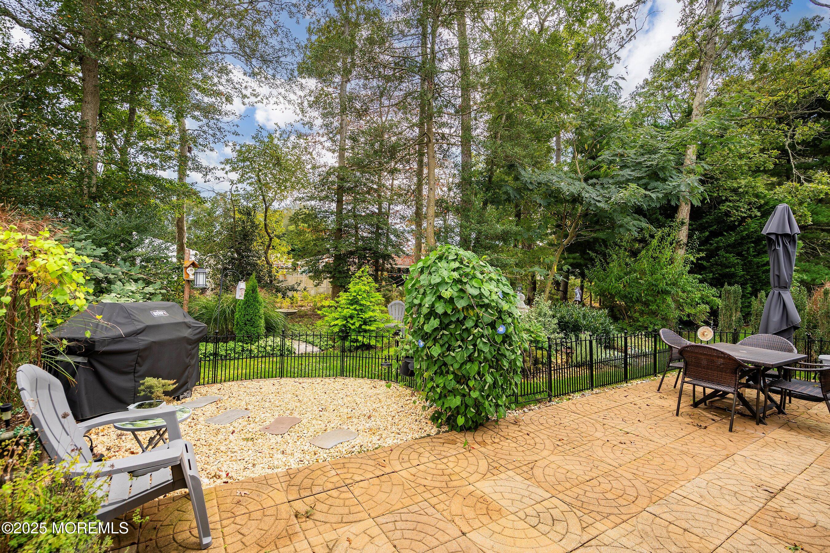 219 Lexington Drive Little Egg Harbor, NJ 08087 - Photo 20 of 30 a view of backyard with seating space