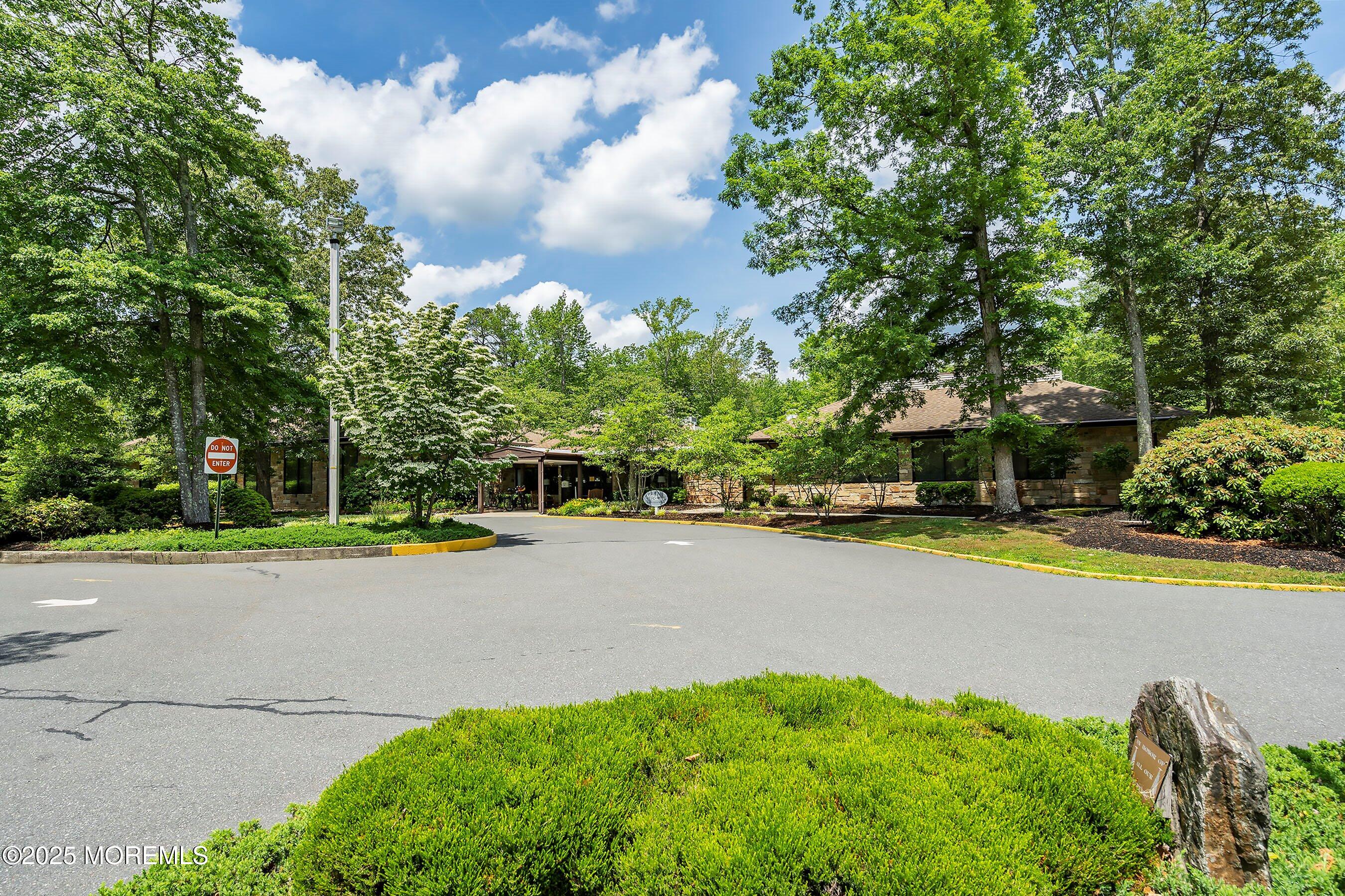 219 Lexington Drive Little Egg Harbor, NJ 08087 - Photo 29 of 30 a view of a swimming pool with an outdoor space and seating area